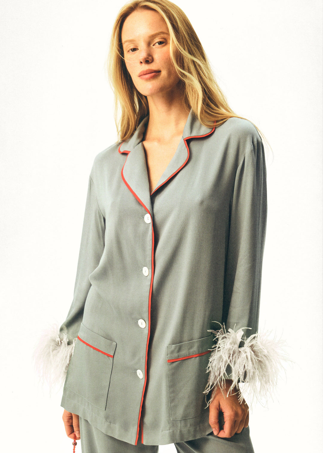The iconic Party Pajama Suit with Feathers